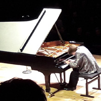 Nicolas Horvath performs at the Philharmonie de Paris joint concert.